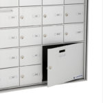 Recessed front-loading horizontal mailboxes with a parcel compartment